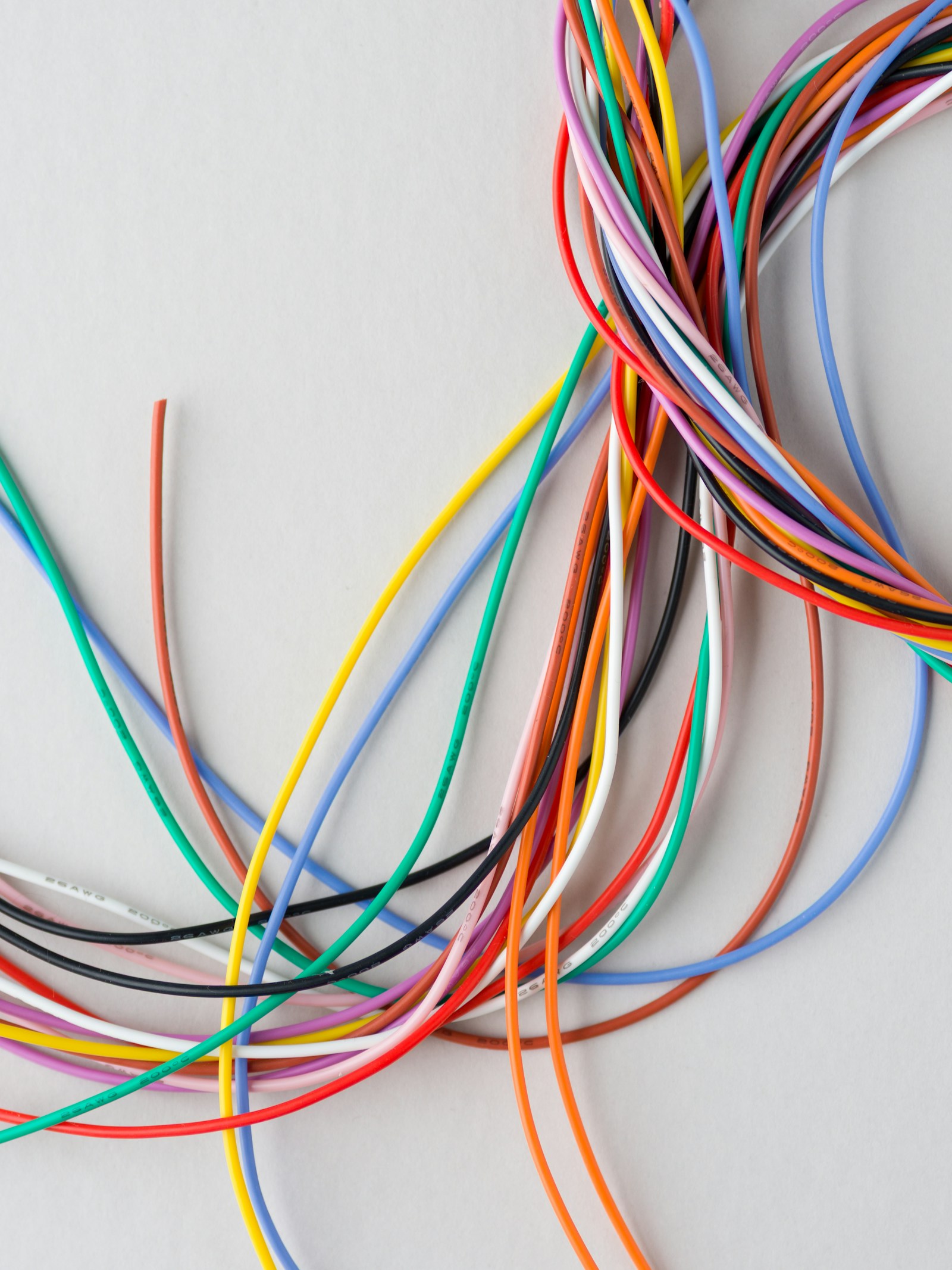 Colourful organised cable and wire bundle ready for installation