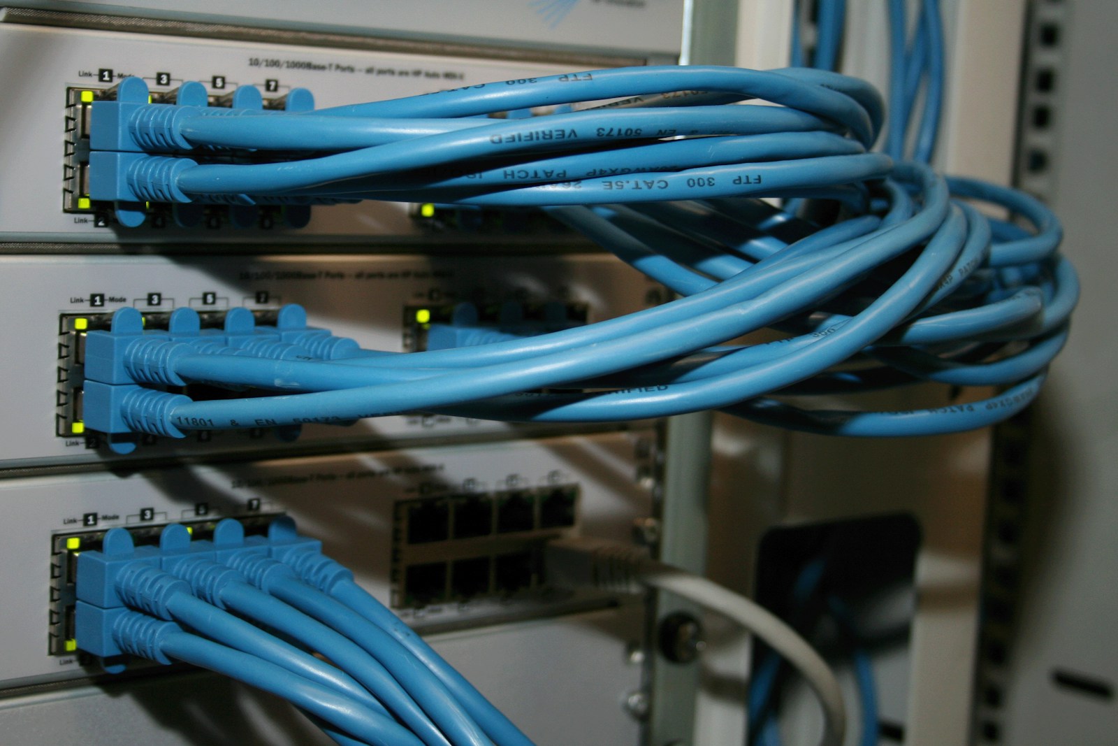 Blue network cabling and connectivity hardware